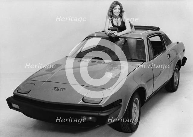 1976 Triumph TR7 with female model. Creator: Unknown.