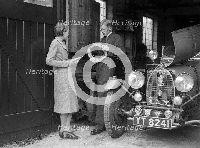 Denis Evans working on his Bugatti Type 43 2262cc. Artist: Bill Brunell.