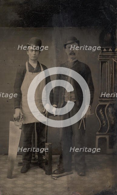 Two Carpenters with a Handsaw, Wood Plane, Hammer, Compass, and Square, 1880s. Creator: Unknown.