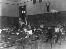 Classroom scenes in Washington, D.C. public schools: general classroom scenes, 1st Division, (1899?) Creator: Frances Benjamin Johnston.
