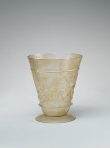 Beaker with Relief-cut Decoration, Iran, 9th-10th century. Creator: Unknown.