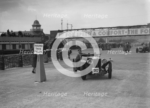 MG Magnette competing in the JCC Rally, Brooklands, Surrey, 1939. Artist: Bill Brunell.