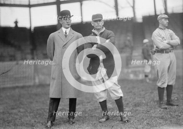 Clark Griffith, right, 1912. Creator: Harris & Ewing.