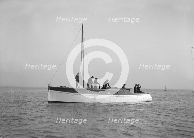 Sailors on board cabin cruiser, 1914. Creator: Kirk & Sons of Cowes.