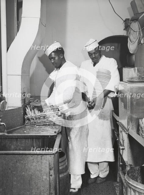 African American restaurant workers, Investment Pharmacy, Washington, D.C., July 1941. Creators: Farm Security Administration, Jack Delano.