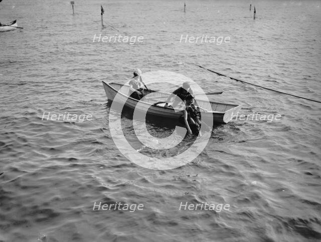 Saving a life, between 1900 and 1905. Creator: Unknown.