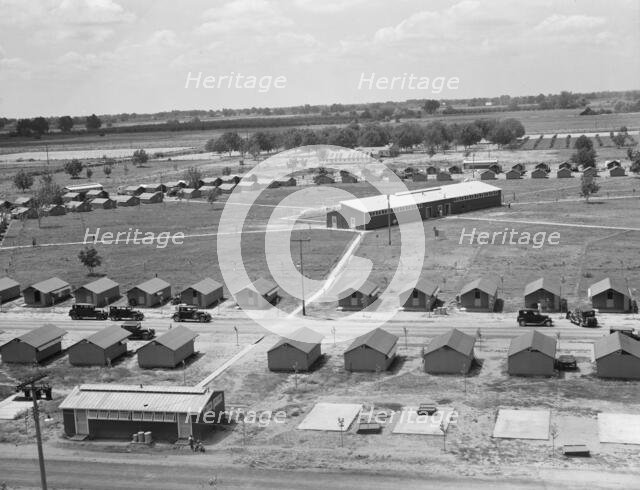 View of FSA camp Farmersville seen from water tower, Tulare County, California, 1939. Creator: Dorothea Lange.