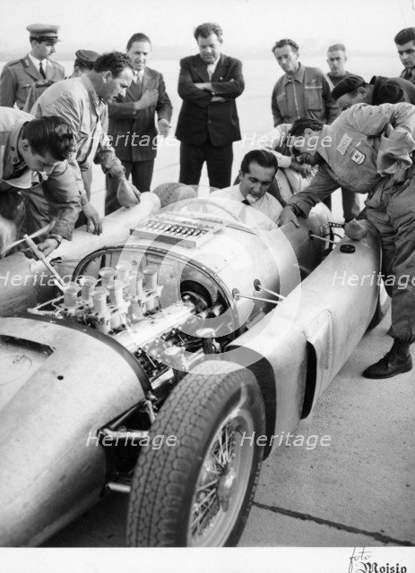 Alberto Ascari at the wheel of the new Lancia Grand Prix car, 1955. Artist: Unknown