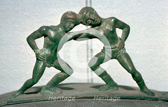 Etruscan bronze handle of a cista, showing Peleus and Thetis wrestling. Artist: Unknown