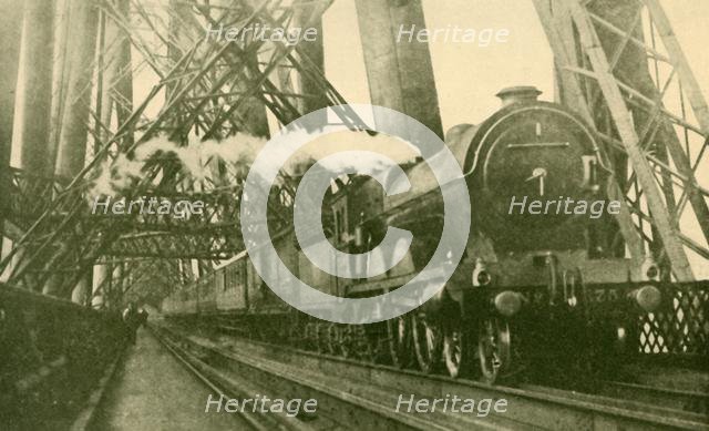 'An Express Train Crossing the Forth Bridge', c1930. Creator: Leslie J. Thompson.