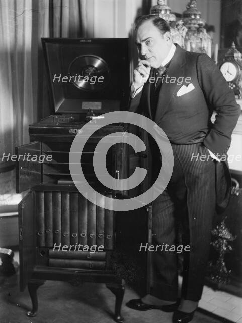 Enrico Caruso with phonograph, between 1918 and c1920. Creator: Bain News Service.
