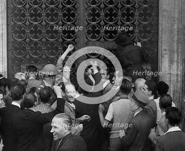 An Angry Mob Attacking a Fascist Building, 1944. Creator: British Pathe Ltd.