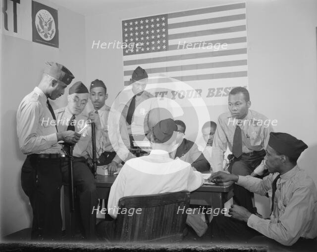 Auxiliary police at a weekly meeting, Washington, D.C., 1942. Creator: Gordon Parks.