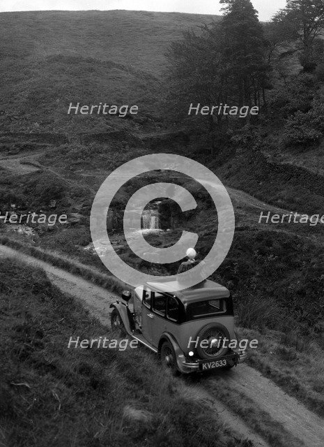 Kitty Brunell road testing a Standard Little Twelve saloon, c1932. Artist: Bill Brunell.