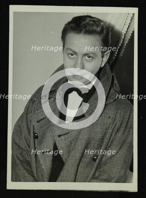 Portrait of American singer, musician and actor Mel Torme, c1950s. Artist: Denis Williams