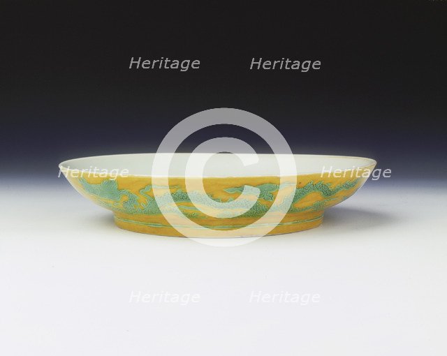 Yellow saucer with dragons in green enamel, Zhengde period, Ming dynasty, China, 1506-1521. Artist: Unknown