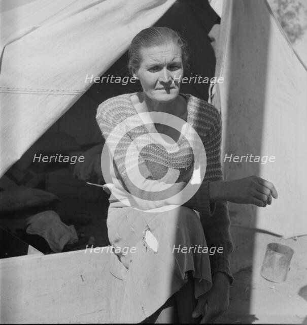 Dust bowl refugee from Chickasaw, Oklahoma, Imperial Valley, California, 1937. Creator: Dorothea Lange.