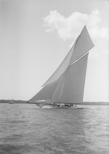 The 19-metre cutter 'Norada' sailing close-hauled, 1911. Creator: Kirk & Sons of Cowes.