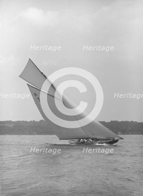 The 8 Metre yacht 'Gundred' (H7) heeling upwind, 1913. Creator: Kirk & Sons of Cowes.