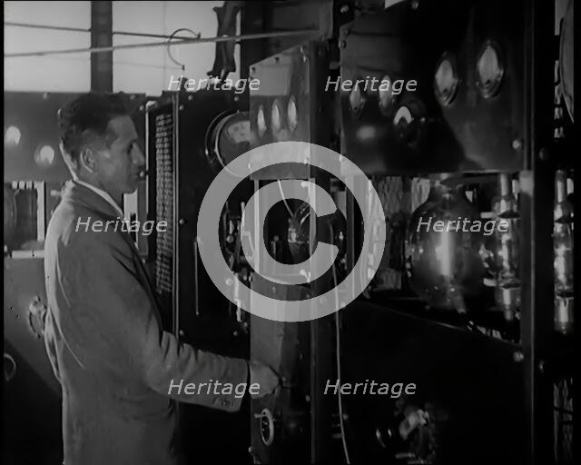 Scottish Engineer and Television Innovator John Logie Baird Testing Television Transmitting...,1920s Creator: British Pathe Ltd.