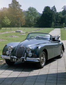 A 1960 Jaguar XK150. Artist: Unknown