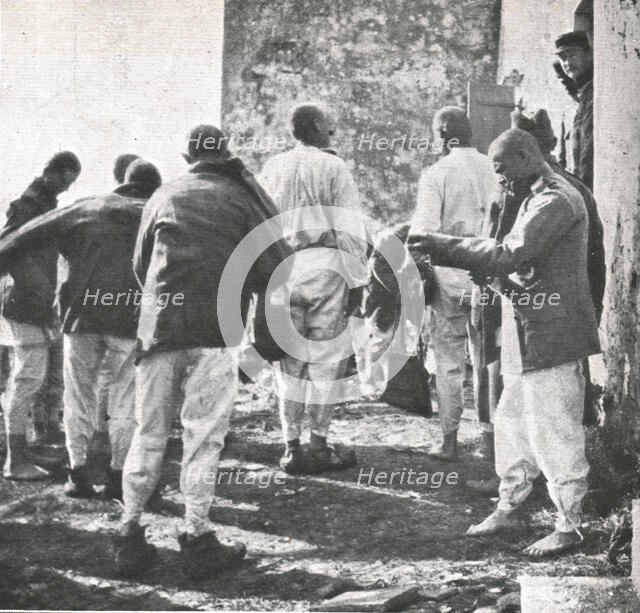 ''Les Exiles; Du linge et des vetements furent distribues a nos allies', 1916 (1924) Creator: Unknown.