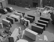 Possibly: United States government workers and carpenters making crates..., Washington, D.C., 1942. Creator: Gordon Parks.