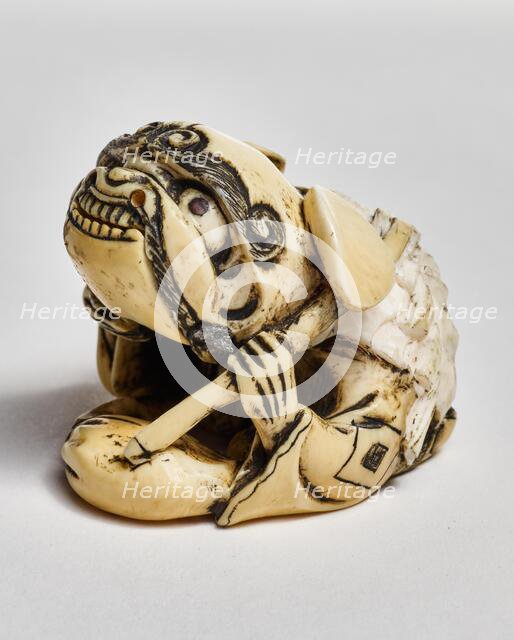 Netsuke (man with lion mask ), about 1850. Creator: Unknown.