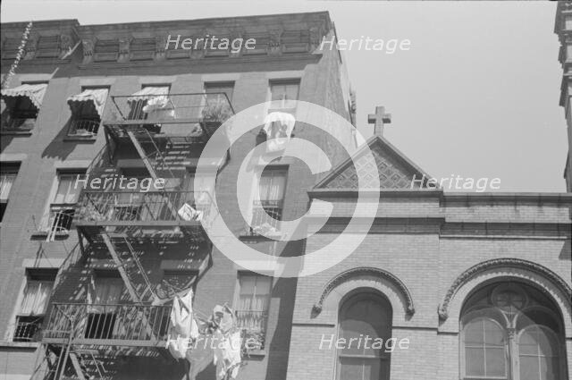 House fronts, 61st Street between 1st and 3rd Avenues, New York, 1938. Creator: Walker Evans.