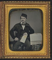 Portrait of seated man holding the Charleston Zeitung, possibly the owner of the newspaper..., 1853. Creator: Unknown.