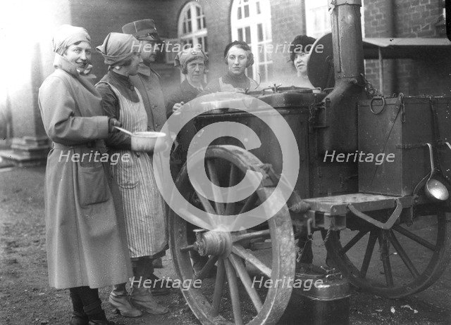 Members of the Womens's Army Auxiliary Corps cooking at a field kitchen, Sweden, 1933. Artist: Unknown