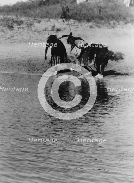 Water rite purification, Cheyenne animal dance, c1927. Creator: Edward Sheriff Curtis.