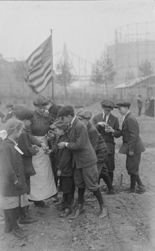 Seed distribution, Rockefeller Garden, 1917. Creator: Bain News Service.