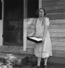 Mrs. Schrock takes good care of her family, Yakima Valley, Washington (near Wapato), 1939. Creator: Dorothea Lange.