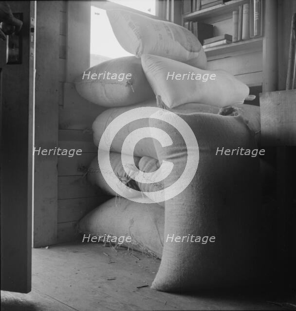 Possibly: Interior of farmer's two-room log home, FSA borrower, Boundary County, Idaho, 1939. Creator: Dorothea Lange.