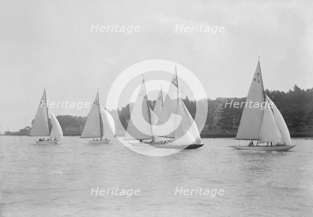 A group of 6 metre boats racing downwind, 1931. Creator: Kirk & Sons of Cowes.