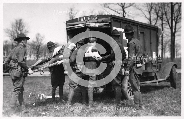 Two wounded soldiers being helped into an ambulance, Fort Sheridan, Illinois, USA, 1930. Artist: Unknown