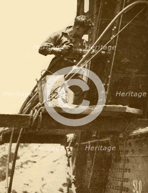 'A Riveting Hammer in Operation on the Sydney Harbour Bridge', c1930. Creator: Unknown.