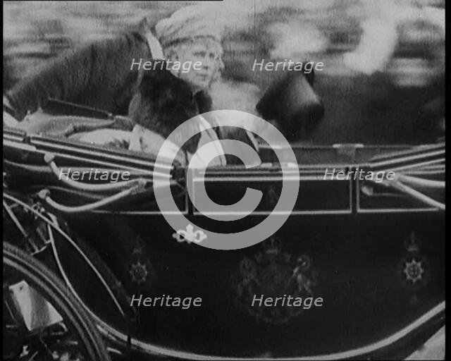 King George V and Queen Mary of Teck Returning to London in an Open Royal Coach, 1929. Creator: British Pathe Ltd.