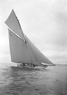 The 12 Metre yacht 'Javotte' sailng close-hauled, 1911. Creator: Kirk & Sons of Cowes.