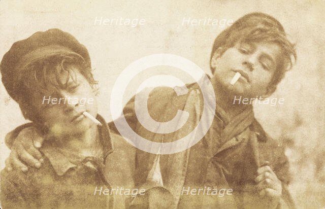 Two boys posing with cigarettes, [between 1900 and 1909?]. Creator: A Caggiano.
