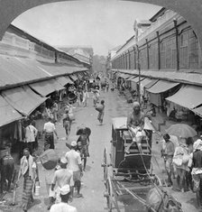 One of the chief native market streets, Rangoon, Burma, 1908. Artist: Stereo Travel Co