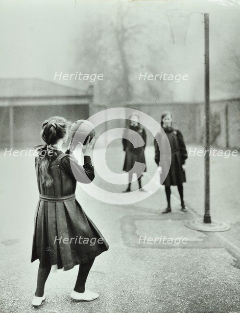 Girls playing netball, Chelsea Secondary School (Hortensia Road School), London, 1911. Artist: Unknown.