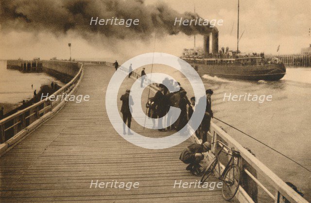 'The Pier and the entrance of the Mail-Steamer',  c1928. Artist: Unknown.