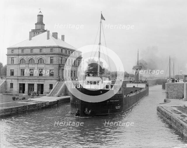 Freighter in Poe Lock, looking down, Sault Ste. Marie, Mich., between 1903 and 1910. Creator: Unknown.