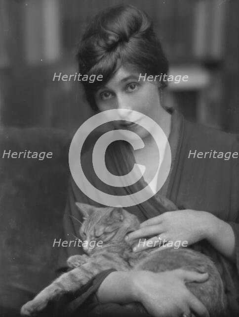 King, Daisy, Miss, with Buzzer the cat, portrait photograph, 1914 June. Creator: Arnold Genthe.