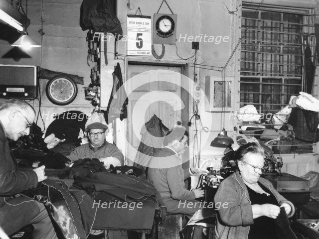 Tailor's workshop, Whitechapel, London, (c1960?) Artist: EH Emanuel
