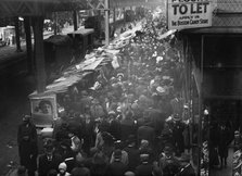 Crowded street, possibly near a subway station, between c1910 and c1915. Creator: Bain News Service.