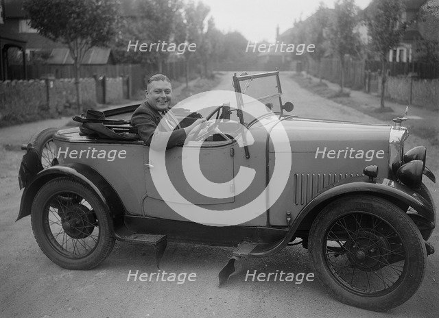 FA Thatcher behind the wheel of a 1929 Triumph Super Seven open four-seater. Artist: Bill Brunell.