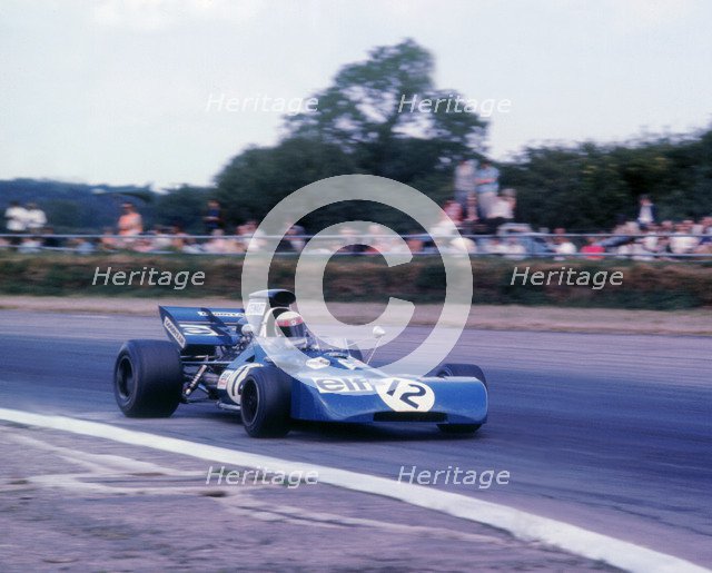 Tyrrell 003 driven by Jackie Stewart in 1971 British GP. Artist: Unknown.